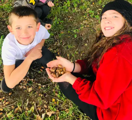 Children Holding Acorns